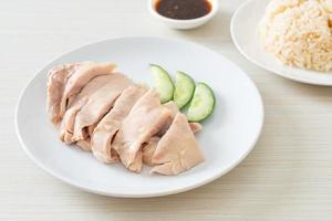 Hainanese chicken rice or rice steamed with chicken soup photo