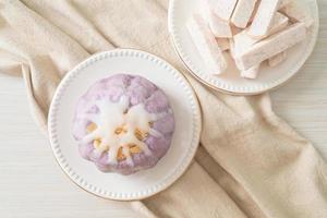 taro bun with white sugar cream and nut photo