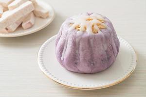 taro bun with white sugar cream and nut photo