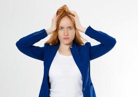 Cute, young beautiful red hair woman do facepalm. Redhead suffer girl headache failed to upset business face palm. Portrait of female doing facepalm posing against studio background. photo