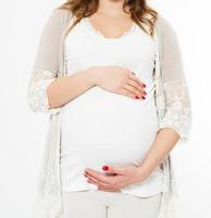 Pregnant woman on white background,birth of a child