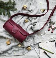 Leather bag and Christmas decorations photo