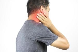 man has neck ache and hand touch with pain  on white background photo
