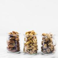 almonds cashewnuts pistachios marble backdrop photo