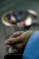 Close-up of a woman's hand in a medic clinic photo