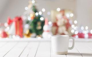 Mug with blurred Christmas festival photo