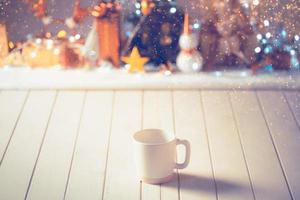 Mug with blurred Christmas festival photo