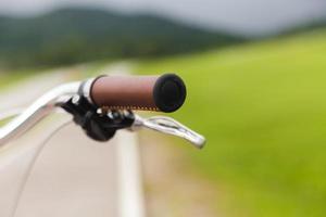 Bicycle handlebar in the garden photo