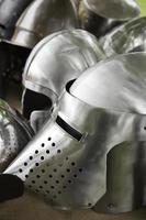 Medieval helmets battle photo