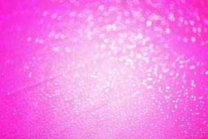 Light pink defocus. Glitter in defocus. Texture for the designer's work. photo