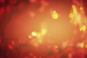 Red orange, yellow soft defocus light as a texture for designers. Glitter defocus. photo