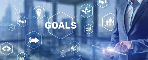 Goals against abstract technology background photo