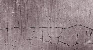 Gray cracked cement texture for background photo