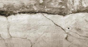 Gray cracked cement texture for background. wall scratches photo