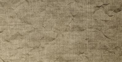 Natural cotton or linen textile. Grunge fabric texture for background photo