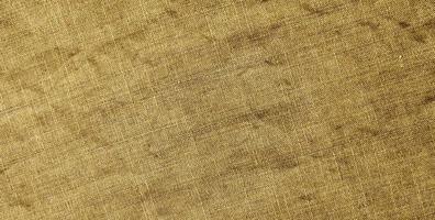 Natural cotton or linen textile. Grunge fabric texture for background photo
