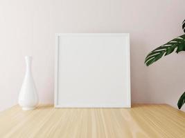 White square frame mockup on wooden table with vase and plants. 3d rendering. photo