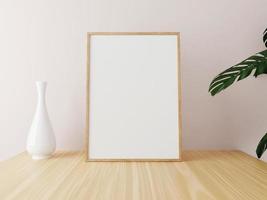 Vertical wooden frame mockup on wooden table with vase and plants. 3d rendering. photo