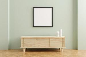 Black square poster frame mockup on wooden table in living room interior on empty pastel color wall background. 3D rendering. photo