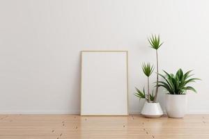 Vertical wooden photo frame mockup on white wall empty room with plants on a wooden floor