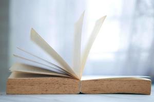 Close up of open books on a table photo