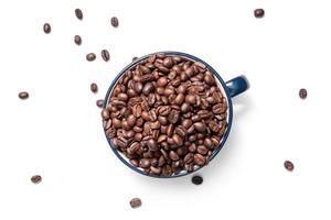 Coffee cup and coffee beans on a white background photo