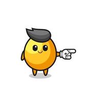 golden egg mascot with pointing right gesture vector