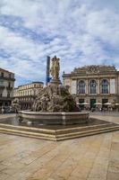 MONTPELLIER, FRANCE, JULY 13, 2015 - The three graces fountain at Place de la Comedie. Fountain Three Graces, built by sculptor Etienne d'Antoine in 1790. photo