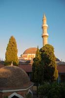 Suleiman Mosque and tower at Rhodes old town. Greece photo