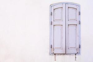 Old wooden windows on the wall photo