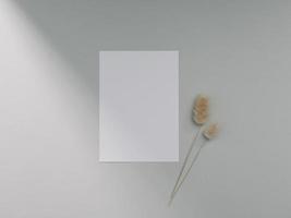 Greeting card mockup, blank invitation card template. Flat lay, Minimalist style photo