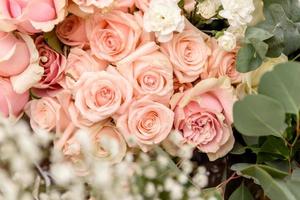 Beautiful floral compositions in the restaurant for the wedding ceremony photo