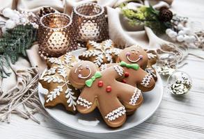 Christmas gingerbread in the plate on white. Top view. photo