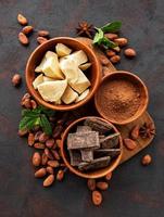 Cocoa beans, butter and chocolate photo