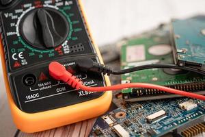 Multimeter electronic digital to measure the voltage of electrical. photo