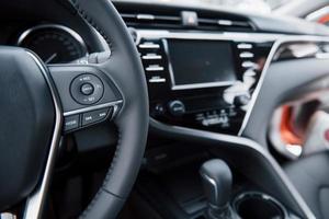 View of the interior of a modern automobile showing the dashboard photo