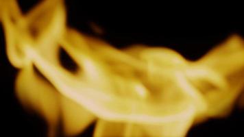 Fire background. Abstract burning flame and black background. photo