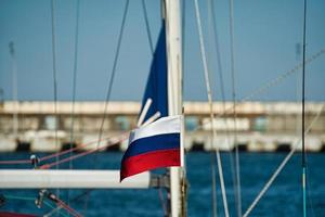 The Russian flag on the yacht in close-up photo