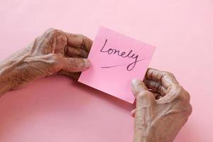 senior women hand hold lonely text