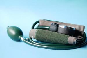 detail shot of blood pressure machine on table photo