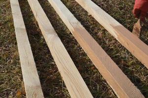 Production of lumber for wooden structures photo