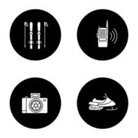 Winter activities glyph icons set. Skiing boards and poles, walkie talkie, photo camera, snowmobile. Vector white silhouettes illustrations in black circles