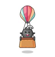 bomb mascot riding a hot air balloon vector
