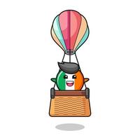 ireland flag mascot riding a hot air balloon vector