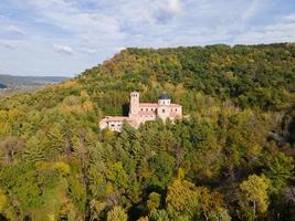 shrine on bluff on sunny day in autumn with beautiful colors peaceful view in midwest wildlife photo