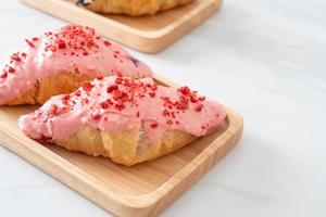 croissant with strawberry chocolate sauce photo