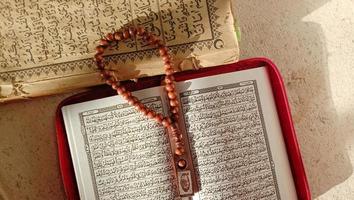 photos of the Quran and prayer beads