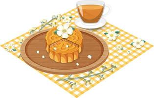 Flower mooncake with teacup set on tablecloth vector