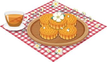 Pile of mooncakes with teacup set on tablecloth vector