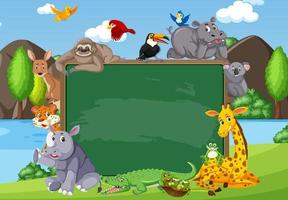 Empty blackboard with various wild animals in the forest vector